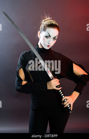 full length portrait of girl wearing medieval costume with sword. standing  pose with back to the camera, isolated on white studio background. Stock  Photo | Adobe Stock