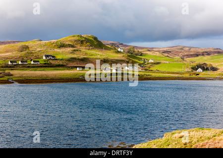 A view over Loch Beag towards Bracadale village, Isle of Skye, Inner Hebrides, Scotland, UK, Europe. Stock Photo