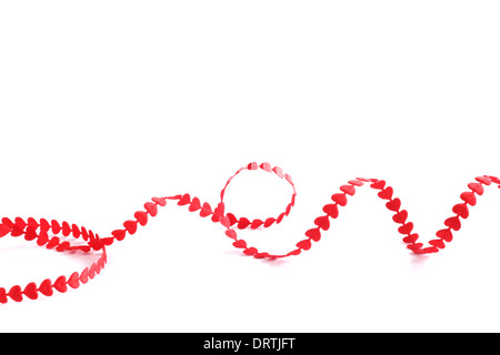 Red ribbon made of hearts isolated on white background Stock Photo