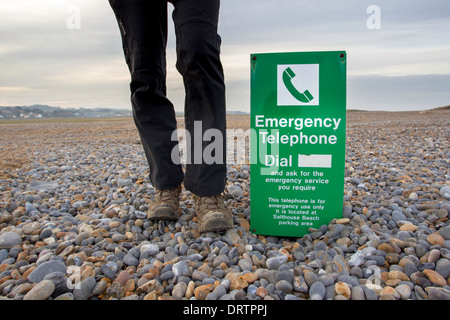 Storm damage at Salthouse, North Norfolk; the storm surge in December 2013 deposited several feet of shingle on the car park Stock Photo