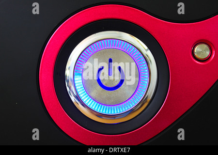Switch the computer on black background. Stock Photo