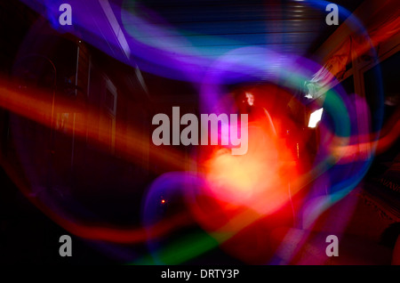 A light painting thats Multi Coloured and the red blob looks like a heart in a surreal way Stock Photo