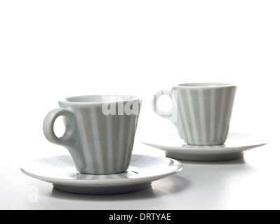 two coffee cups on white table Stock Photo