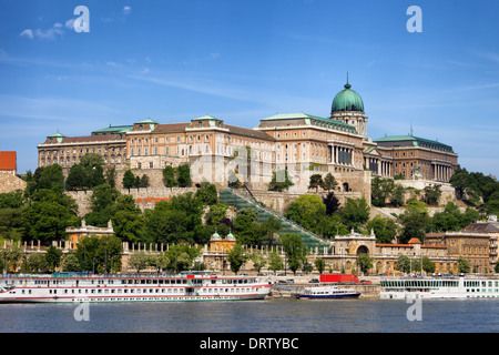 Buda Castle (Royal Palace) and passenger boats on the Danube River in ...