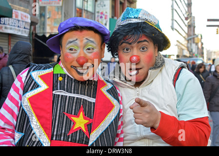 2 Mexican American clowns at the Chinese New Year parade on Mott Street in Chinatown, New York City. Stock Photo