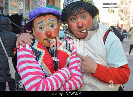 2 Mexican American clowns at the Chinese New Year parade on Mott Street in Chinatown, New York City. Stock Photo