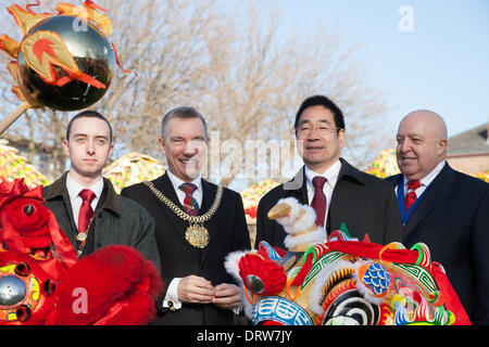 London, UK. 2nd Feb 2014. Lord Mayor of Liverpool Gary Millar and Liverpool Mayor Joe Anderson pose with Chinese Dragons during Chinese new Year celebrations in Liverpool. Liverpool has one of the oldest Chinese communities in Europe. Credit:  Adam Vaughan/Alamy Live News Stock Photo