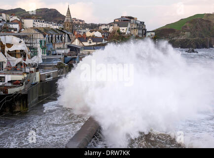 Gigantic waves crash into the seaside town of Ilfracombe at high tide, Devon as the UK embraces stormy weather. Credit:  guy harrop/Alamy Live News Stock Photo