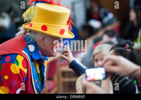 London, UK. 2nd Feb 2014. Clowns gather at the Holy Trinity church for the annual Clowns' Church Service that remembers the Georgian gagster Joey Grimaldi, inventor of the modern clown, who died in 1837. Credit:  Piero Cruciatti/Alamy Live News Stock Photo