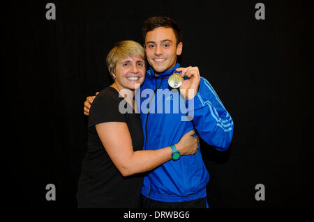 Southend-on-Sea, UK. 02nd Feb, 2014. Tom Daley of Plymouth Diving poses with his Gold winners medal from the Mens 10m Platform Final and his new coach Jane Figueiredo, head of the new high performance diving centre in London, on Day 3 of the British Gas Diving National Cup 2014 from Southend Swimming and Diving Centre. Credit:  Action Plus Sports/Alamy Live News Stock Photo