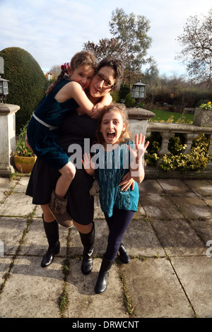 woman 39 with two children aged 7 and 9 Stock Photo