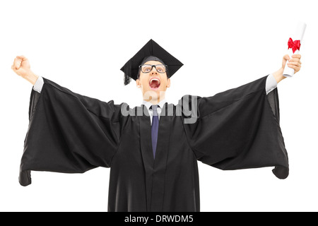 Male graduate student holding a diploma and throwing his hands in the air Stock Photo