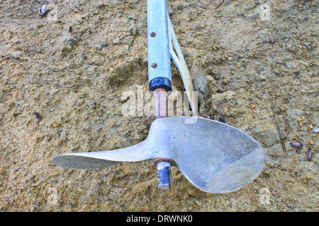 The propeller of a boat. on the ground Stock Photo