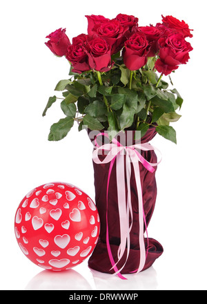 Bouquet from red roses in vase and balloon isolated on white background. Closeup. Stock Photo