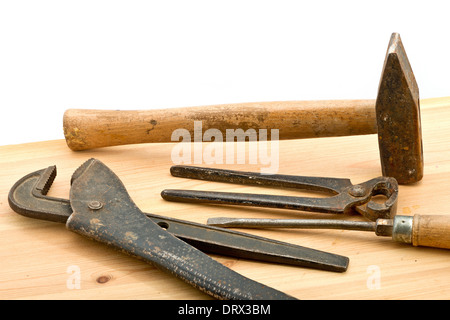 old used tools on the wooden desk Stock Photo