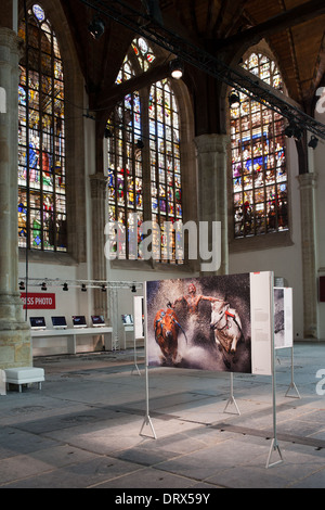 World Press Photo exhibition 2013 in the Old Church (Dutch: Oude Kerk) in Amsterdam, Holland, Netherlands. Stock Photo