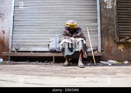 Homeless man in Old Delhi, India Stock Photo