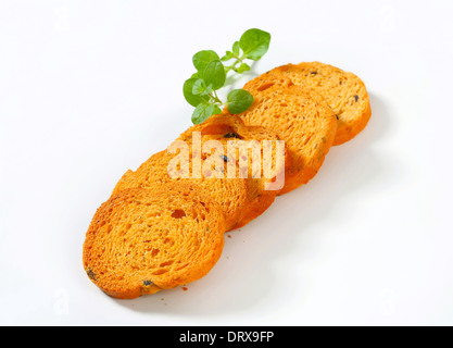 Small round toasts with black olives Stock Photo