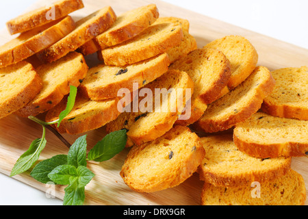 Small round toasts with black olives Stock Photo