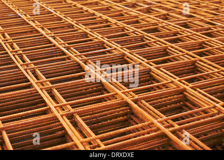 Reinforcing steel mesh, close up image of construction material. Stock Photo