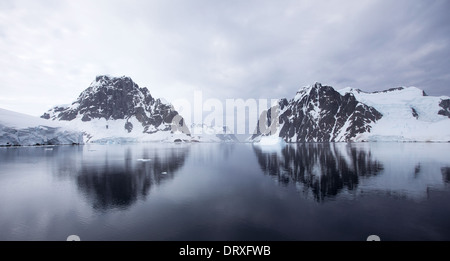 Entrance to the Lemaire Channel in Antarctica - Beautiful reflections in the water Stock Photo