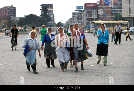 Woman walking across Skanderbeg Square in central Tirana, Albania Stock Photo