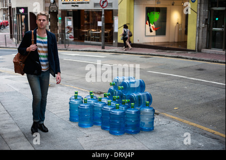 Bonaqua mineral water bottles lined up in Wyndham Street in the centre of old Hong Kong Stock Photo