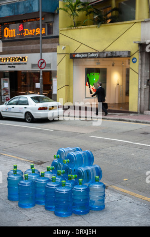 Bonaqua mineral water bottles lined up in Wyndham Street in the centre of old Hong Kong Stock Photo