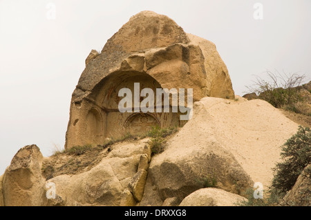 ASIA, Turkey, Cappadocia, Çavuşin, typical Cappadocian scenery with unusual rock formations and chapel set in the rock Stock Photo