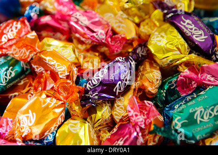 wrapped individual roses chocolates Stock Photo