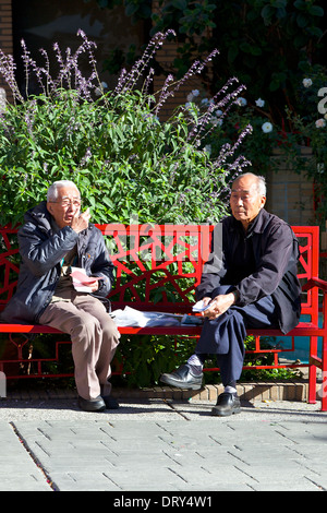 Two old Chinese Men in Old Chinatown Central Plaza, Los Angeles. Stock Photo
