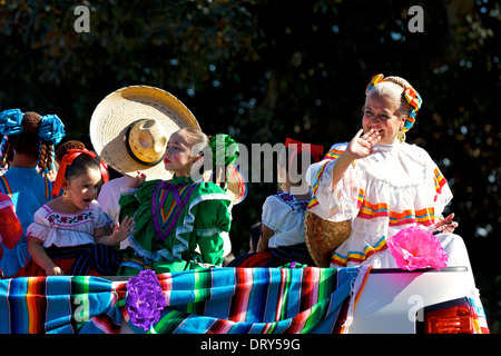 'House Mother' & young children in traditional national dress, appearing in the LA Chinatown, Chinese New Years Day Parade, 2014 Stock Photo