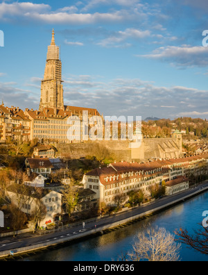 Bern cathedral at Aare river taken in golden hour Stock Photo