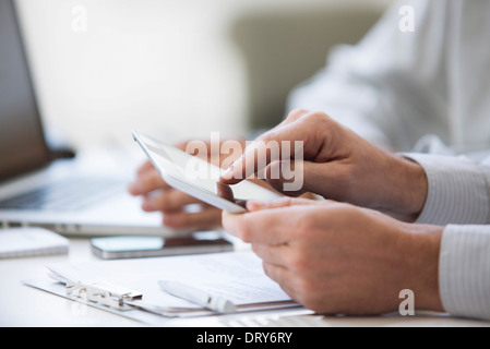 Man using digital tablet, cropped Stock Photo