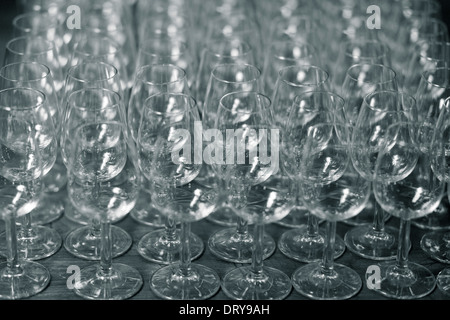 Glasses arranged in rows Stock Photo