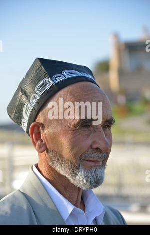 Man wearing traditional hat, Samarkand, Uzbekistan Stock Photo