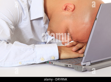 Man fell asleep on his laptop. Stock Photo