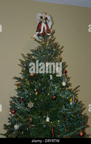 Christmas tree with angel on top Stock Photo