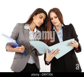 Two successful businesswomen dicussing and looking to documents isolated on white Stock Photo