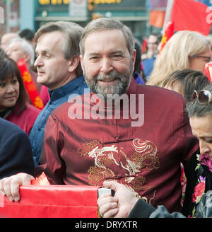 Vancouver, British Columbia, Canada. 4th Feb, 2014. Canada's federal opposition leader THOMAS MULCAIR (NDP) arrives in Chinatown for the start of the 2014 Chinese New Year Parade celebrating the Year of the Horse in Vancouver. Credit:  Heinz Ruckemann/ZUMA Wire/ZUMAPRESS.com/Alamy Live News Stock Photo