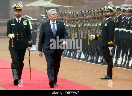 New Delhi, India. 05th Feb, 2014. President of Germany, Joachim Gauck (C), inspects a guard of honor during his welcome reception in New Delhi, India, 05 February 2014. President Gauck is in India on his six days official visit to strengthen the political and business ties between the two countries. Photo: WOLFGANG KUMM/dpa/Alamy Live News Stock Photo