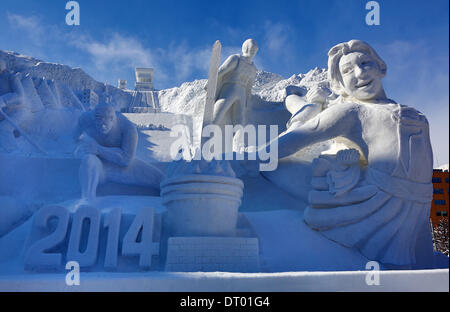 Sapporo, Japan. 5th February 2014. Ice sculpture called 'Winter Sports Paradise, Hokkaido' features the winter sports athletes cheering the Japanese team to victory at the Sochi Olympic Games at the first day of the 65th Sapporo Snow Festival 2014 in Sapporo, Japan. Over two million people are expected to attend the week long festival. Credit:  Paul Brown/Alamy Live News Stock Photo