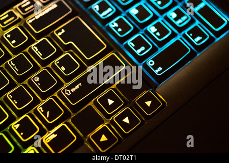 neon bright yellow light blue glowing keyboard Stock Photo