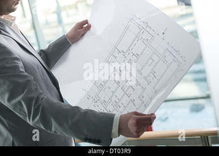 architectural plan in the hands of an architect Stock Photo