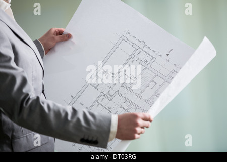 architectural plan in the hands of an architect Stock Photo