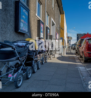 Baby carriages lined up outside, Reykjavik, Iceland Stock Photo