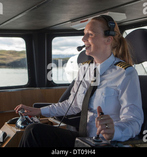 Female caption operating a ferry boat, The Baldur, Stykkisholmur, Snaefellsnes, Iceland Stock Photo