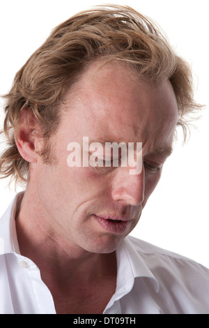 Portrait of a sad worried man on white background Stock Photo