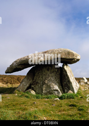 Chun Quoit, Cornwall: a small, 'closed box' Neolithic burial chamber surrounded by the remains of a kerbed round barrow.