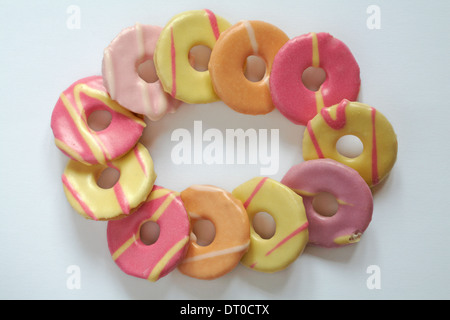 ring of Fox's mini party rings biscuits set on white background Stock Photo